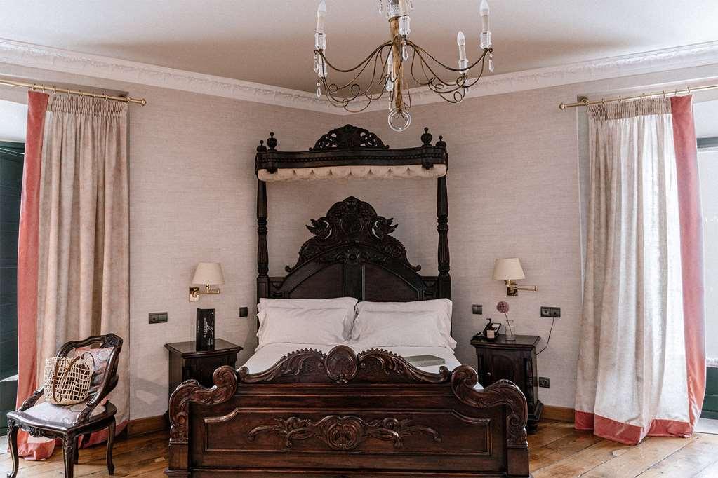 帕拉西奥阿维莱斯nh收藏酒店 客房 照片 A bedroom at the hotel